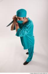 FALCO DOCTOR STANDING POSE WITH KNIFE